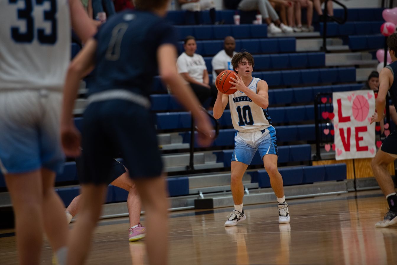 Varsity Boys Basketball Advance to Regionals