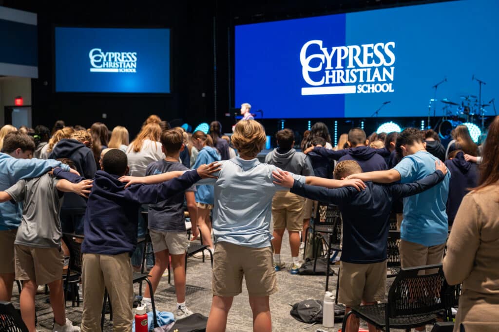 Middle school students worship during Spiritual Emphasis Days at Cypress Christian School